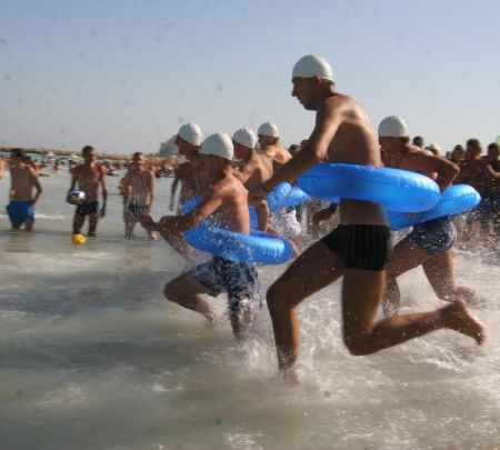 Olimpicii obişnuiţi sar gropi şi cară frigidere