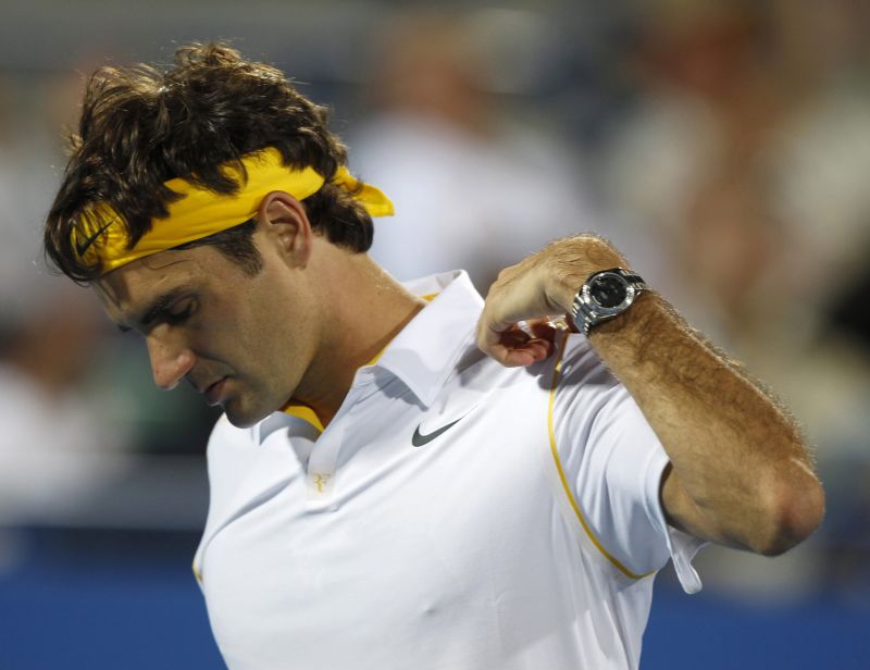 Federer, chinuit pe limba lui