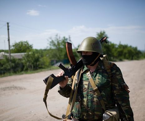 Ucraina votează în bătaia puștii