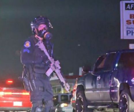 Proteste VIOLENTE în orașul american Ferguson după uciderea unui tânăr de culoare de către poliție