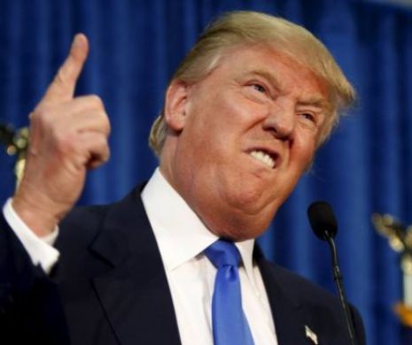 Donald Trump o CRITICĂ pe Angela Merkel şi îl laudă pe Vladimir PUTIN