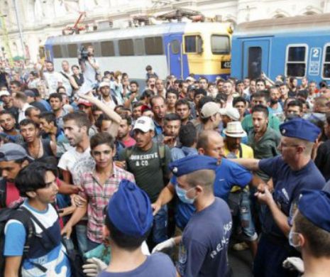 Refugiaţii creează probleme în Germania. Ministrul de Interne a criticat comportamentul lor