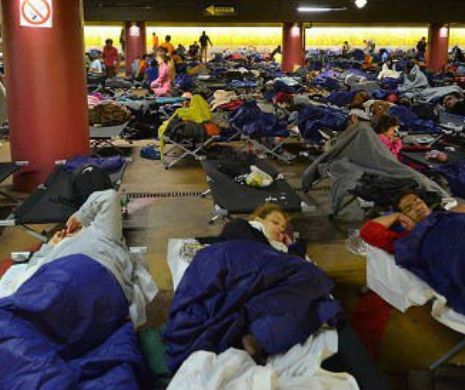 Un TRAFICANT de imigranți, filmat cu camera ascunsă în timpul negocierilor
