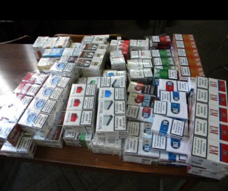 Afacere ”legală”: un patron plătea hoți să fure țigări pe care le vinde apoi la magazinul său