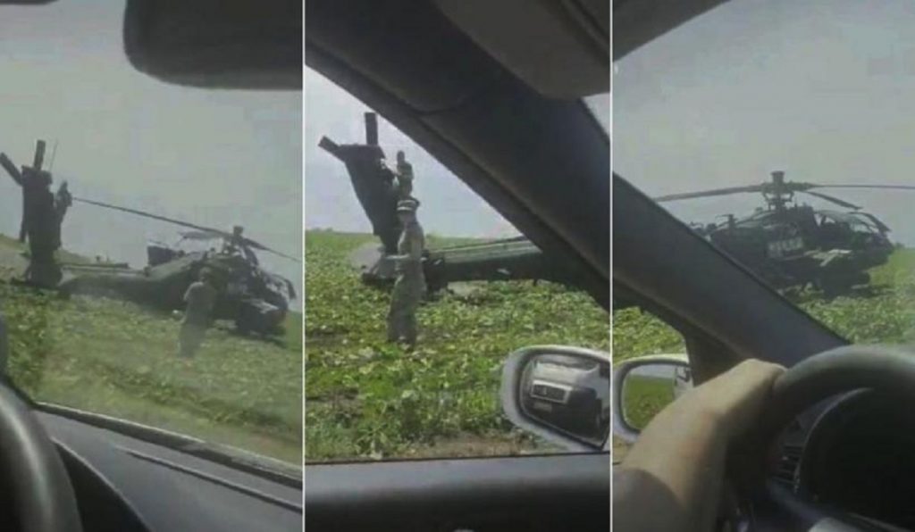 Elicopter Apache, la pământ, în rapiță. Unul dintre cele mai performante aparte de zbor a avut probleme misterioase