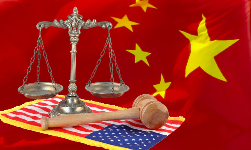 Familiile a doi americani închiși în China îi cer intervenția lui Trump